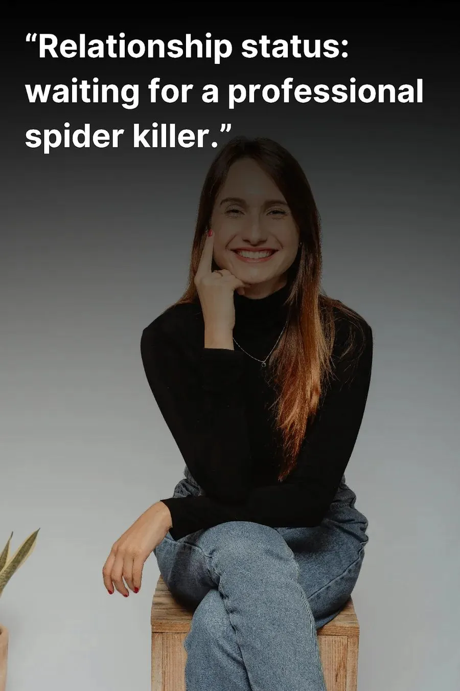 Woman in jeans smiling for the camera