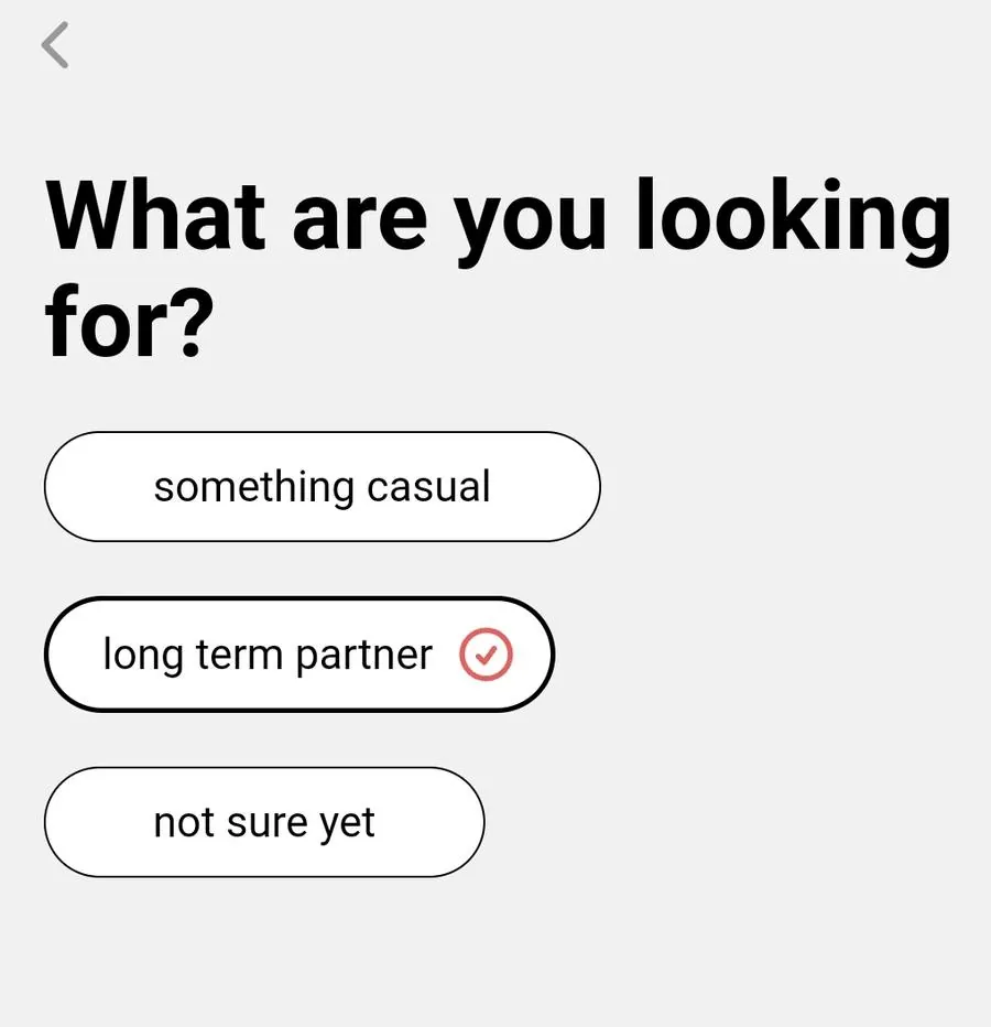 Screenshot of YourMove AI's Profile Writer showing the question "What are you looking for?"