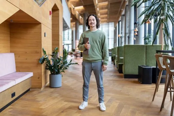 Handsome man taking a full body shot for dating app
