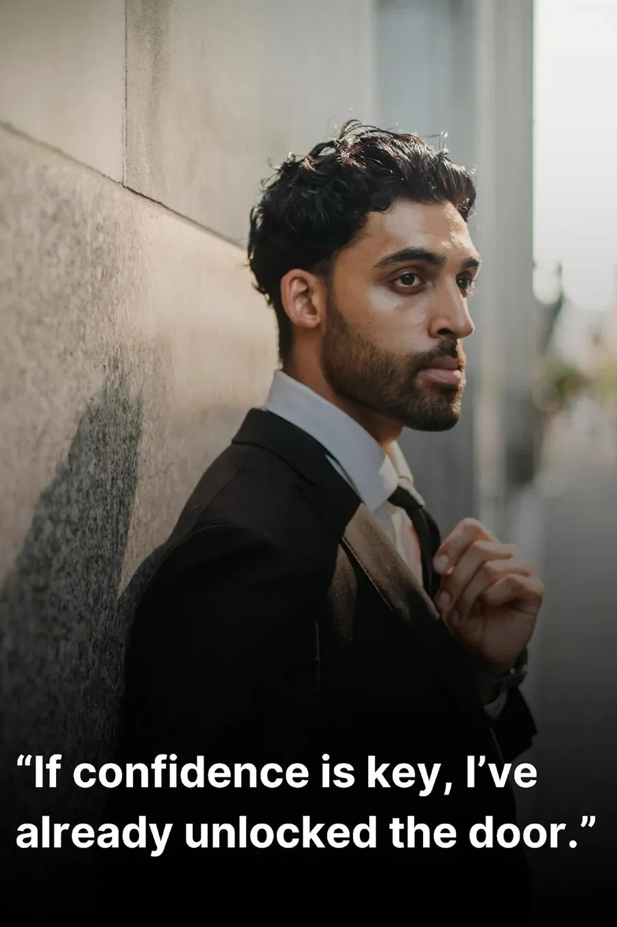 Confident man posing in a suit