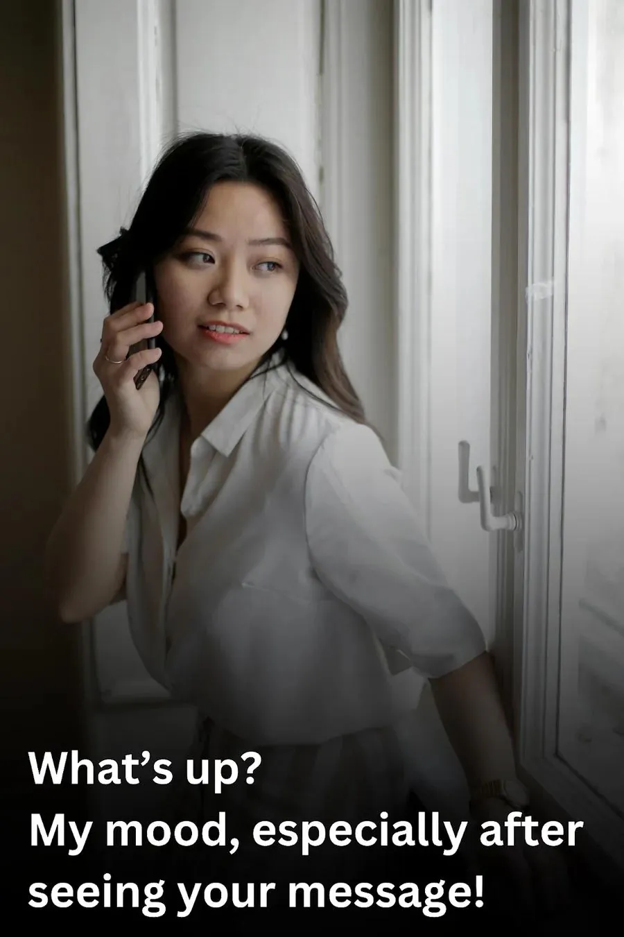 young woman asking someone "what's up?" on the phone