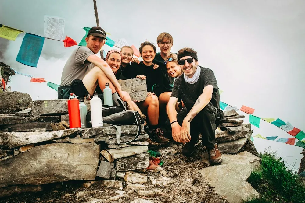 A group of friends taking group photo for dating profile photo